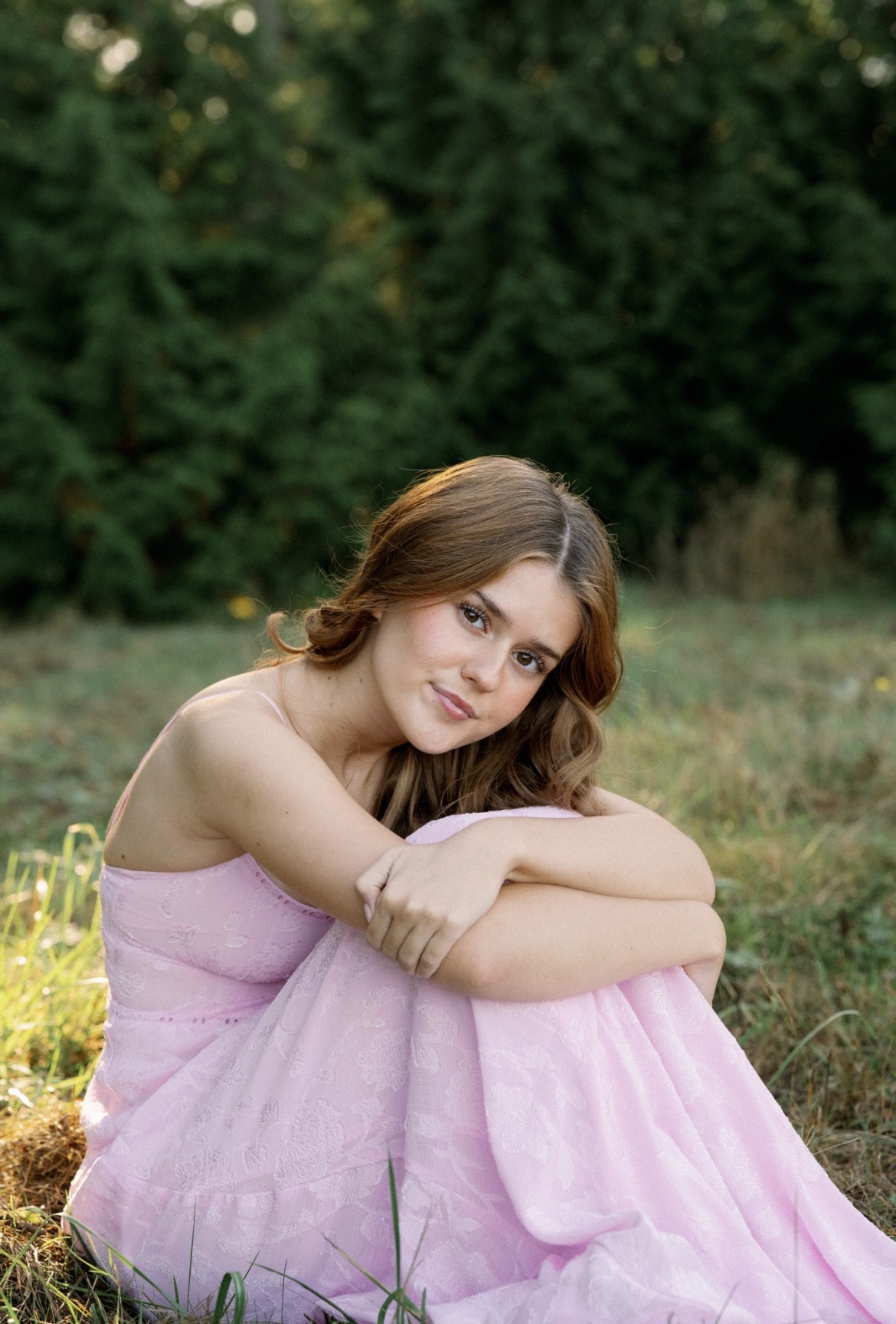 Portrait of photographer Patricia smiling in natural light